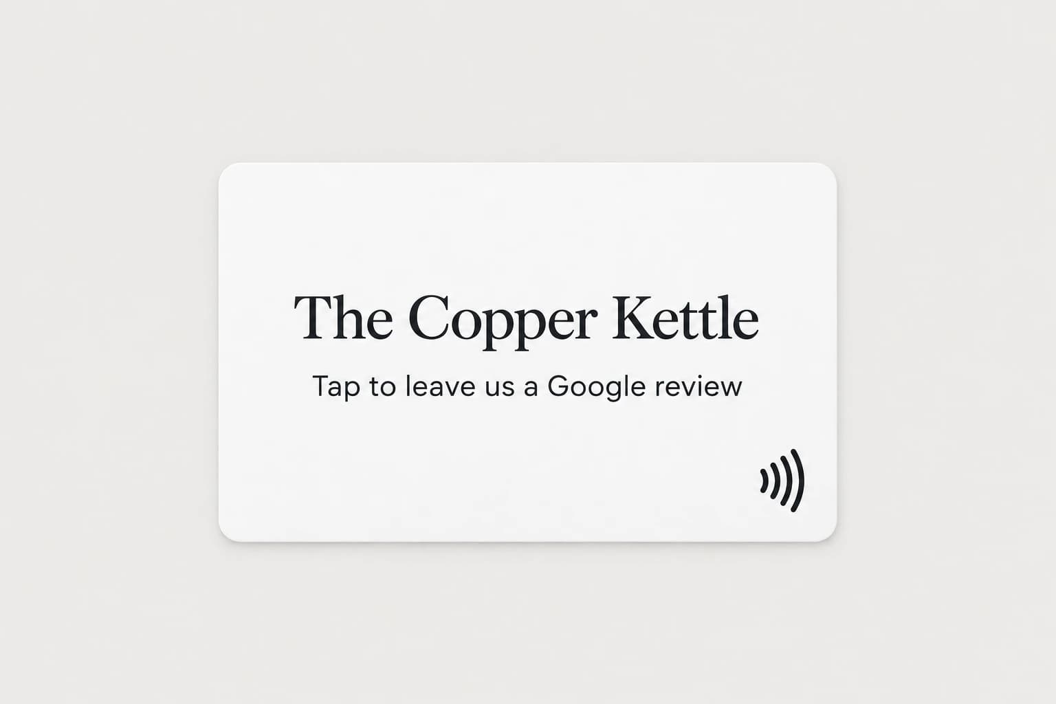 A white NFC card printed with The Copper Kettle, Tap to leave us a Google review, and a small tap symbol