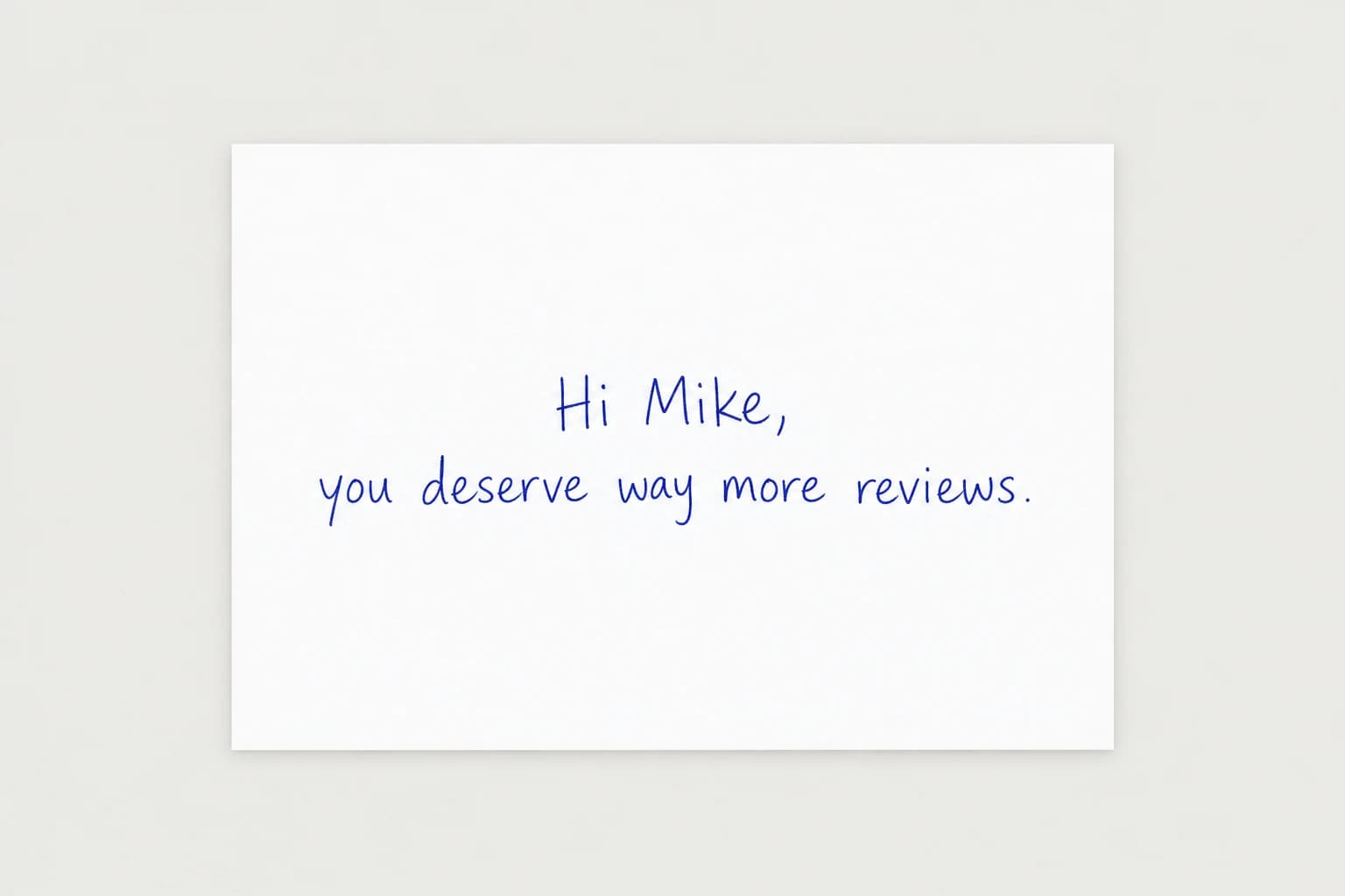 A white card handwritten in blue pen: Hi Mike, you deserve way more reviews